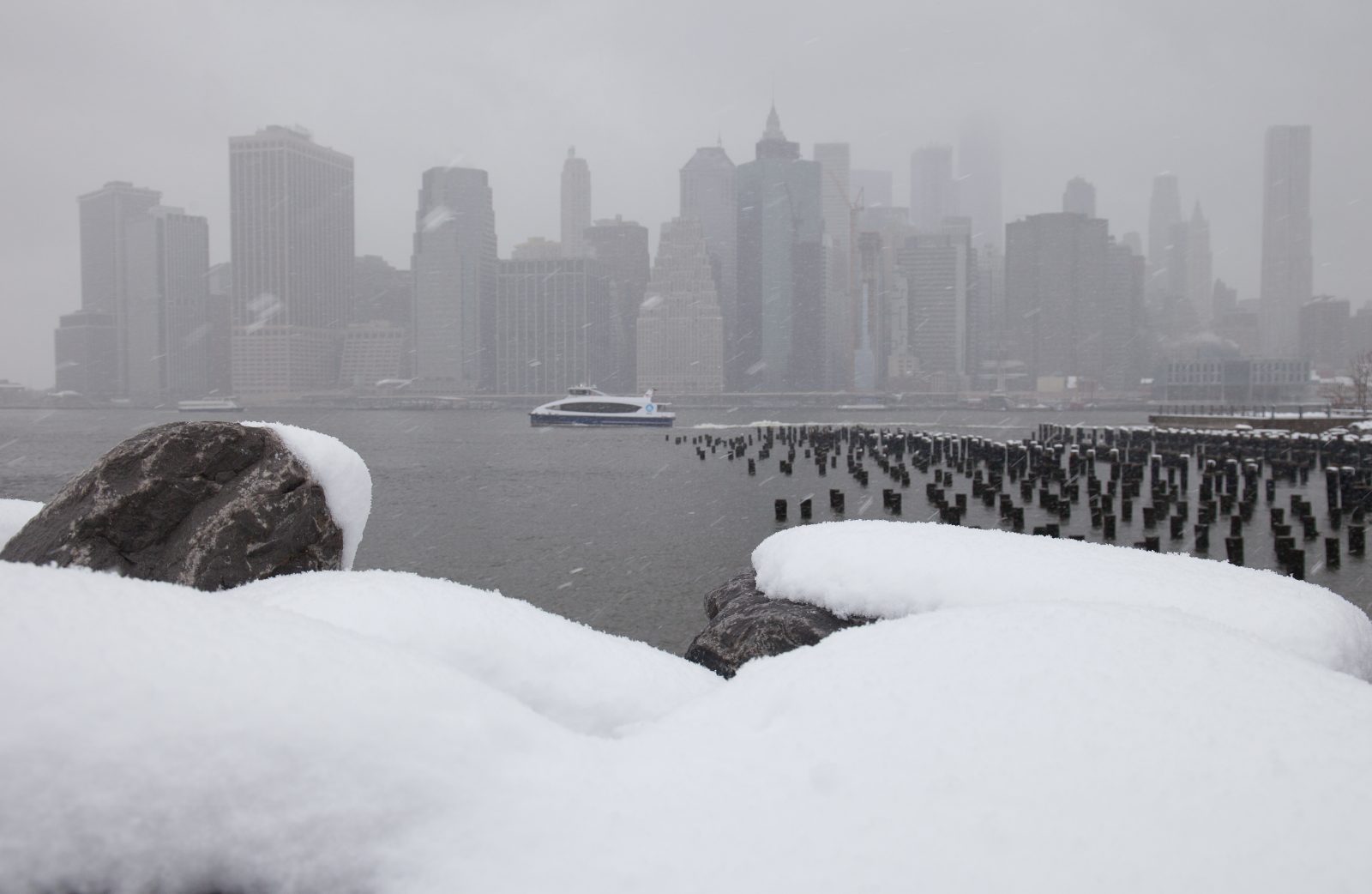 Wednesday, March 21, 2018. Brooklyn, New York City - Today was the first day of Spring, but it feels like Winter. It is snowing at the Brooklyn Bridge Park. A beautiful Winter-Spring day! Photo by Javier Soriano/LoveIsAmor.com
