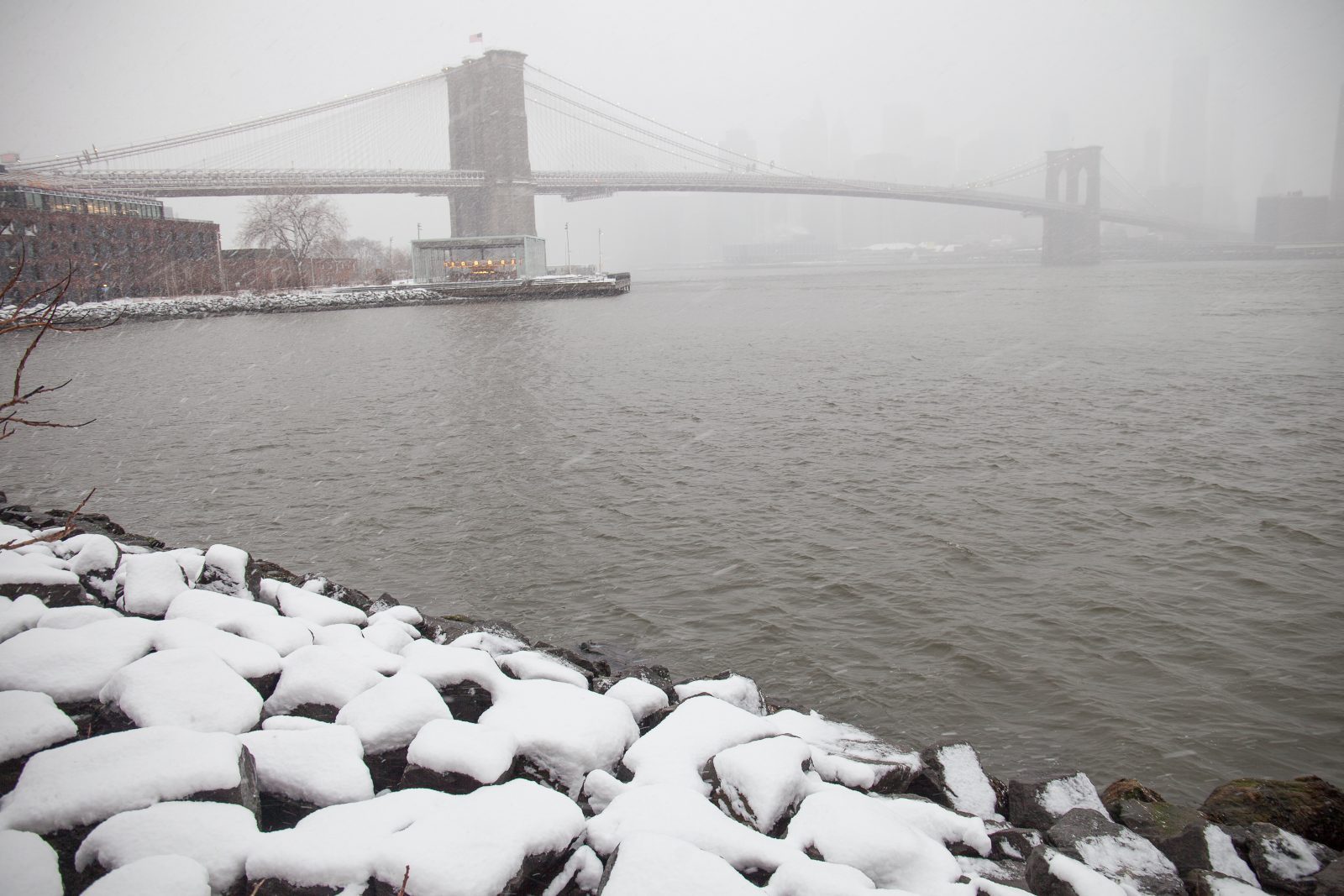 Wednesday, March 21, 2018. Brooklyn, New York City - Today was the first day of Spring, but it feels like Winter. It is snowing at the Brooklyn Bridge Park. A beautiful Winter-Spring day! Photo by Javier Soriano/LoveIsAmor.com