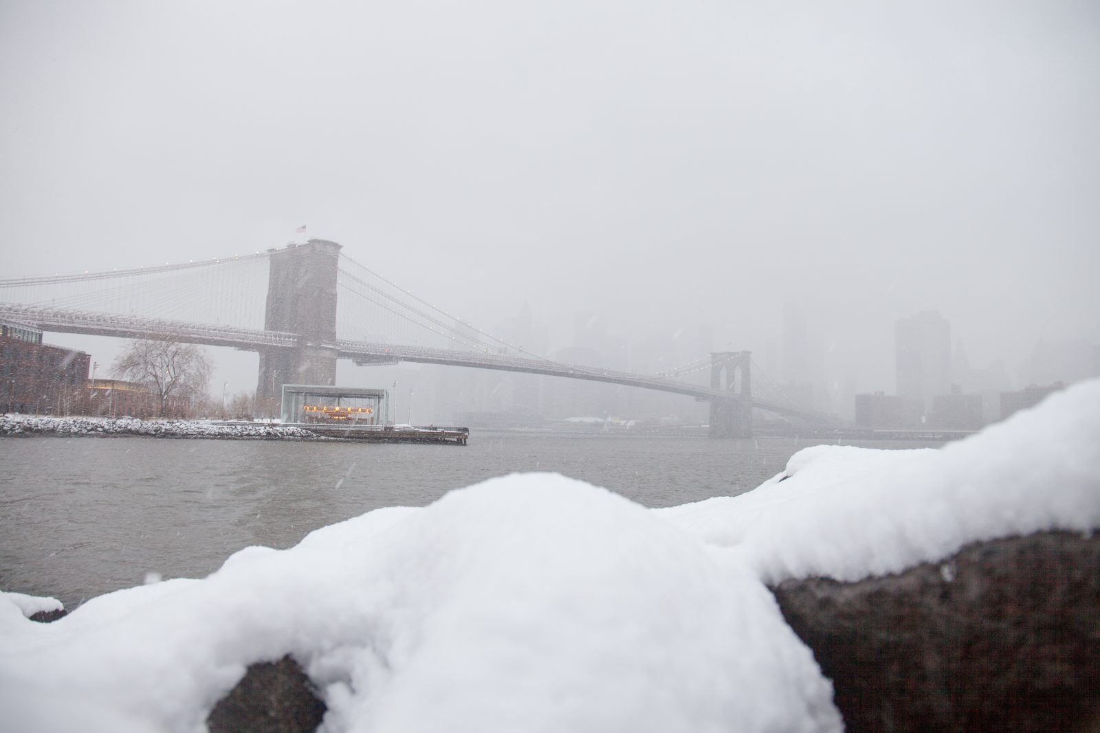 Wednesday, March 21, 2018. Brooklyn, New York City - Today was the first day of Spring, but it feels like Winter. It is snowing at the Brooklyn Bridge Park. A beautiful Winter-Spring day! Photo by Javier Soriano/LoveIsAmor.com