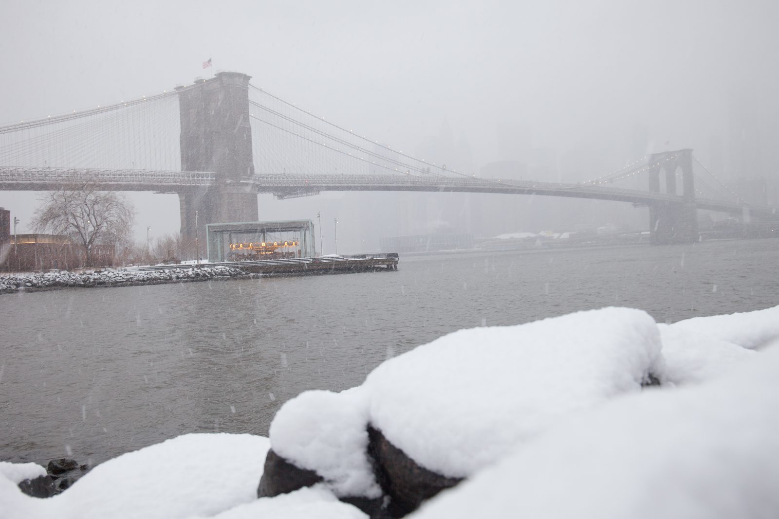 Wednesday, March 21, 2018. Brooklyn, New York City - Today was the first day of Spring, but it feels like Winter. It is snowing at the Brooklyn Bridge Park. A beautiful Winter-Spring day! Photo by Javier Soriano/LoveIsAmor.com