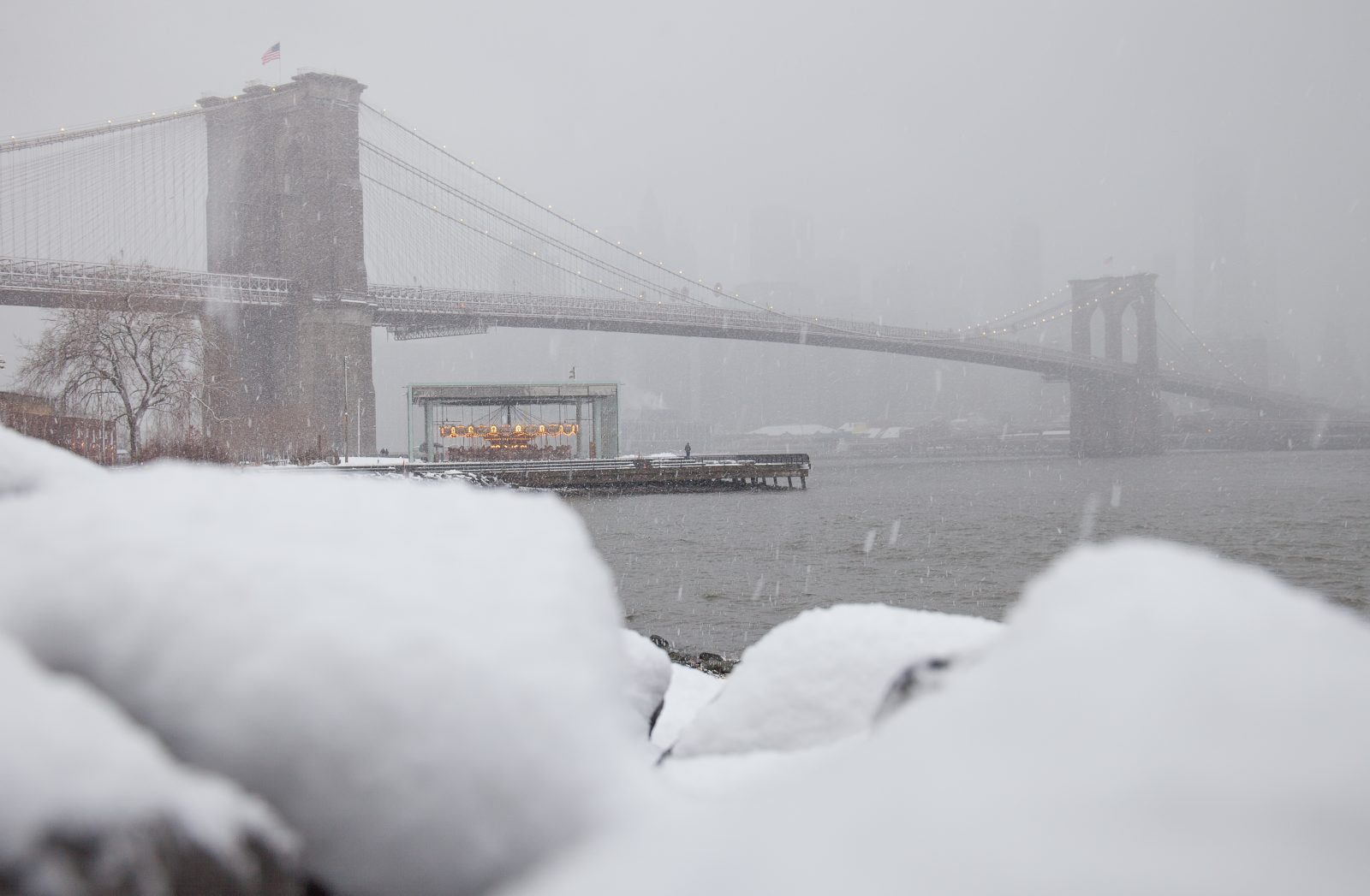 Wednesday, March 21, 2018. Brooklyn, New York City - Today was the first day of Spring, but it feels like Winter. It is snowing at the Brooklyn Bridge Park. A beautiful Winter-Spring day! Photo by Javier Soriano/LoveIsAmor.com