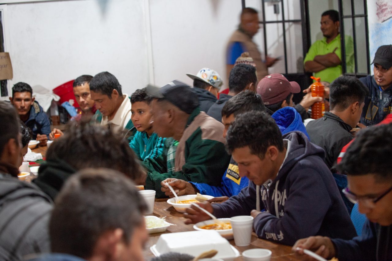 Tlaquepaque, Guadalajara. Jalisco, Mexico. Sunday, November 18th, 2018. Refugees from Centro America having dinner at "El Refugio. Casa del Migrante." Volunteers prepare meals for them. Credit: Photo by LoveIsAmor.com