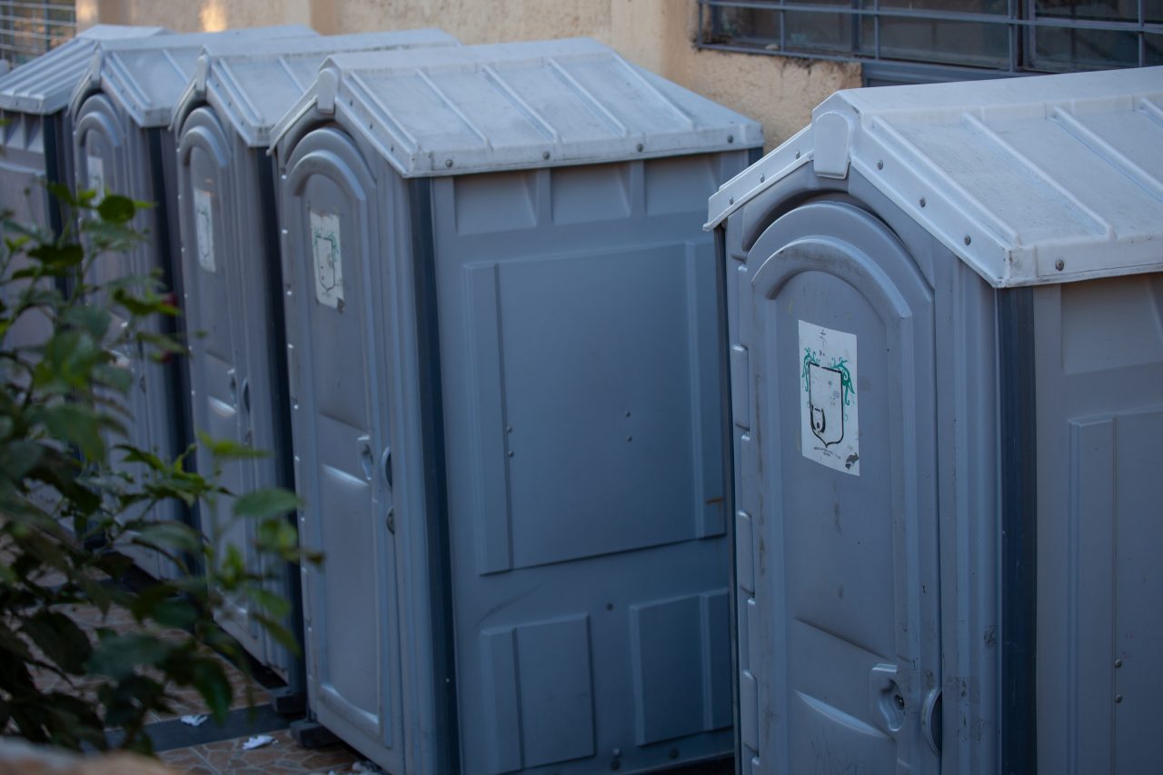 Tlaquepaque, Guadalajara. Jalisco, Mexico. Monday, November 19th, 2018. Portable toilets at "El Refugio. Casa del Migrante". Hundreds of refugees fleeing violence in Central America have been staying at "El Refugio. Casa del Migrante" for one or two days. Credit: Photo by LoveIsAmor.com