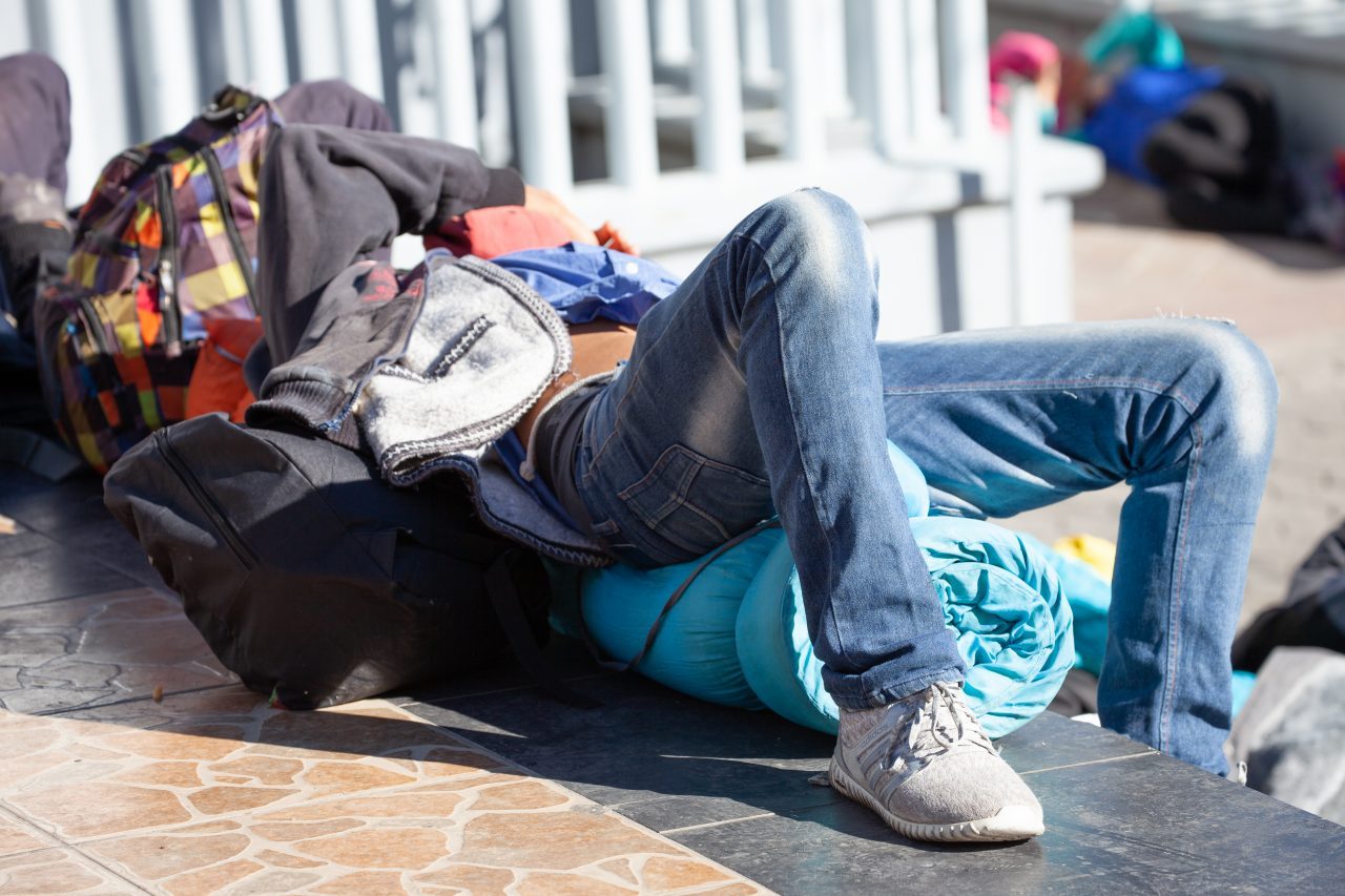 Tlaquepaque, Guadalajara. Jalisco, Mexico. Monday, November 19th, 2018. Immigrant resting before he starts walking to Sinaloa. Hundreds of refugees fleeing violence and extreme poverty in Central America have been staying at "El Refugio. Casa del Migrante" for one or two days. This refugee is part of the second caravan. Credit: Photo by LoveIsAmor.com
