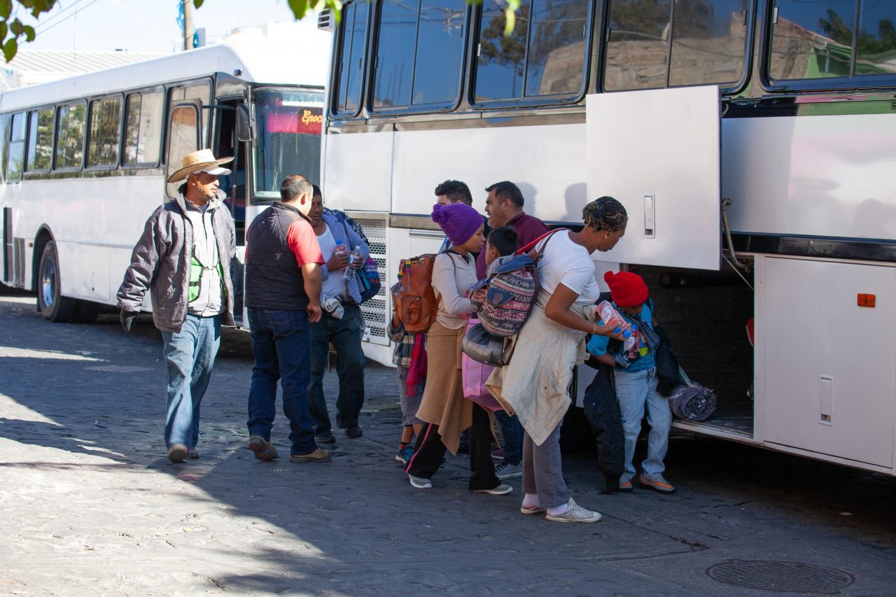 Tlaquepaque, Guadalajara. Jalisco, Mexico. Monday, November 19th, 2018. A refugee mother and her children boarding a bus to Sinaloa. Hundreds of refugees fleeing violence and extreme poverty in Central America have been staying at "El Refugio. Casa del Migrante" for one or two days. These refugees are part of the second caravan. They want to apply for asylum in the United States of America. Credit: Photo by LoveIsAmor.com