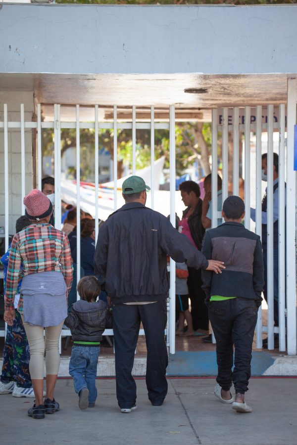 Tijuana, Baja California. Mexico. Monday, November 26th, 2018. Refugees arriving from Mexicali, Baja California. They are going to stay at Unidad Deportiva Benito Juárez (an improvised shelter for the caravans of immigrants). Refugees are fleeing violence and extreme poverty in their countries in Central America. They want to apply for asylum in the United States of America. Credit: Photo by LoveIsAmor.com
