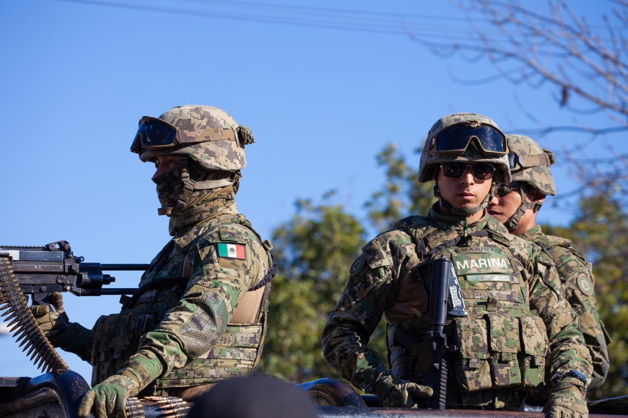 Tijuana, Baja California. Mexico. Monday, November 26th, 2018. Mexican Marina (the Mexican Secretariat of the Navy (Spanish: Secretaría de la Marina, SEMAR) is a member of the federal executive cabinet with responsibility for managing the country's navy and marine forces) is giving food to refugees staying at Unidad Deportiva Benito Juárez. Refugees are fleeing violence and extreme poverty in their countries in Central America. They want to apply for asylum in the United States of America. Credit: Photo by LoveIsAmor.com