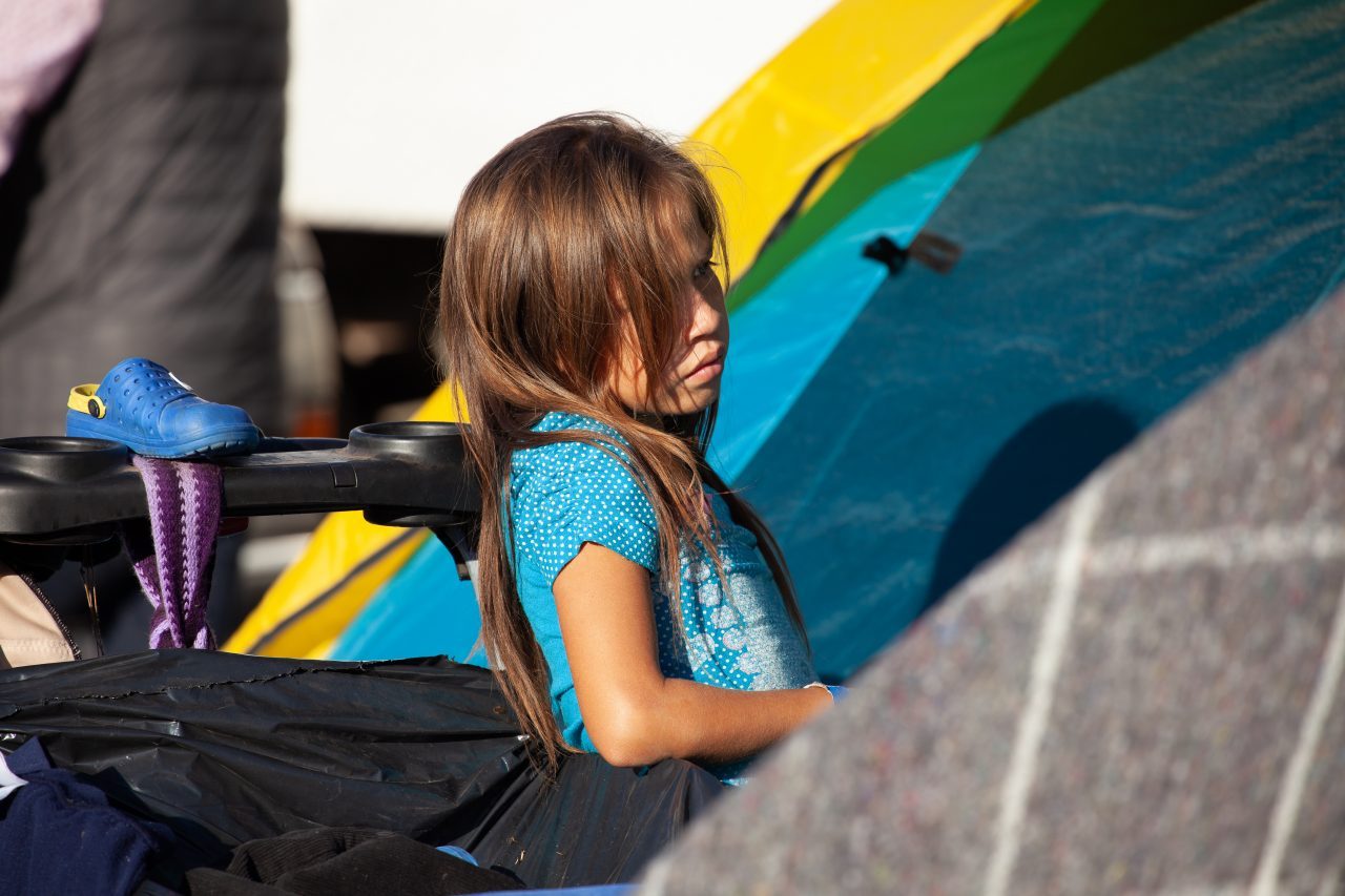 Tijuana, Baja California. Mexico. Monday, November 26th, 2018. A little girl refugee at Unidad Deportiva Benito Juárez (an improvised shelter for the caravans of immigrants). Refugees are fleeing violence and extreme poverty in their countries in Central America. They want to apply for asylum in the United States of America. Credit: Photo by LoveIsAmor.com