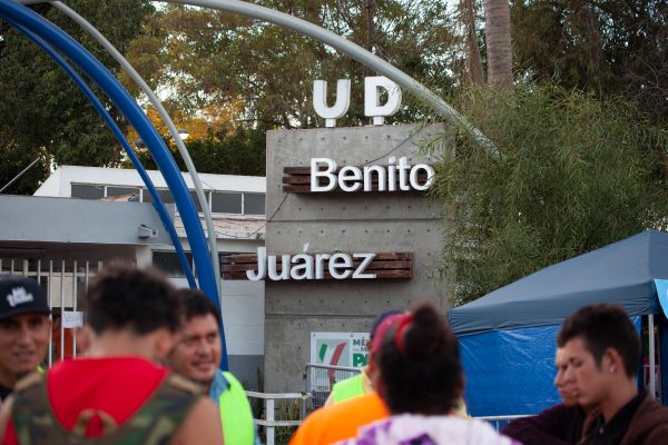 Tijuana, Baja California. Mexico. Monday, November 26th, 2018. People in front of the Unidad Deportiva Benito Juárez (an improvised shelter for the caravans of immigrants). Refugees are fleeing violence and extreme poverty in their countries in Central America. They want to apply for asylum in the United States of America. Credit: Photo by LoveIsAmor.com