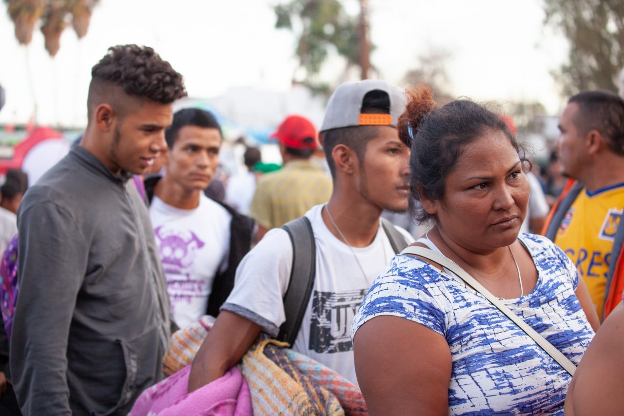 Tijuana, Baja California. Mexico. Tuesday, November 27th, 2018. Refugees arriving from Mexicali, Baja California. Mexico. They are going to stay at Unidad Deportiva Benito Juárez (an improvised shelter for the caravans of immigrants). Refugees are fleeing violence in their countries in Central America. They want to apply for asylum in the United States of America. Credit: Photo by LoveIsAmor.com