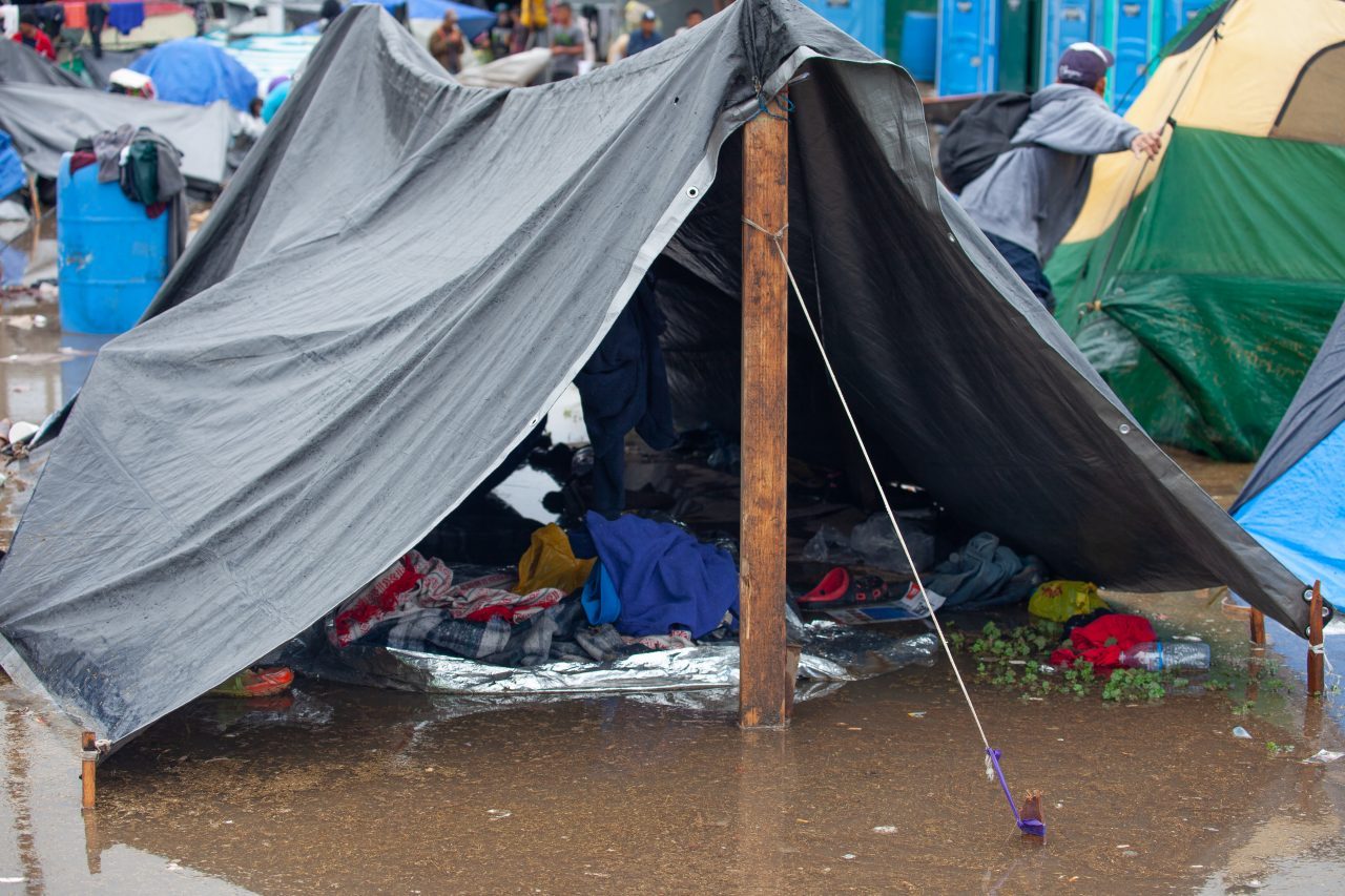 Tijuana, Baja California. Mexico. Thursday, November 29th, 2018. It was raining last night and it was raining all day today. The Mexican government needs to find a shelter for the refugees where they can be protected from the rain and cold. Refugees are staying at Unidad Deportiva Benito Juárez (an improvised shelter for the caravans of immigrants). Refugees are fleeing violence in their countries in Central America. They want to apply for asylum in the United States of America. They were told they have to wait more than a month to apply for asylum. Credit: Photo by LoveIsAmor.com