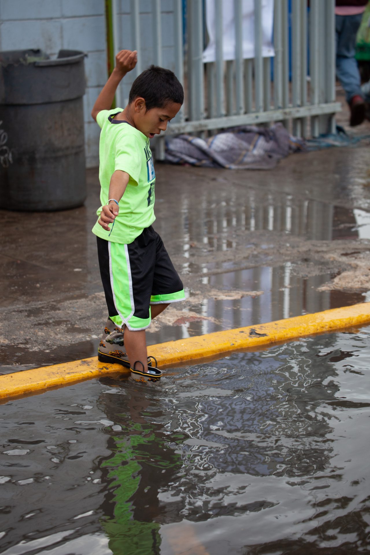 Tijuana, Baja California. Mexico. Thursday, November 29th, 2018. It was raining last night and it was raining all day today. The Mexican government needs to find a shelter for the refugees where they can be protected from the rain and cold. Refugees are staying at Unidad Deportiva Benito Juárez (an improvised shelter for the caravans of immigrants). Refugees are fleeing violence in their countries in Central America. They want to apply for asylum in the United States of America. They were told they have to wait more than a month to apply for asylum. Credit: Photo by LoveIsAmor.com