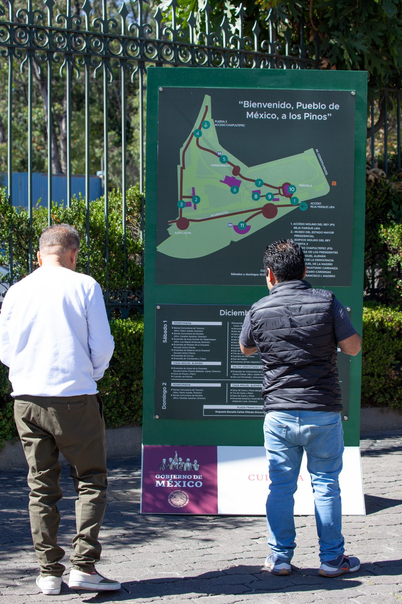 Mexico City, Mexico. Saturday, December 1, 2018. Men at Los Pinos. The "Official Residence of Los Pinos" was the residence of the Mexican presidents. As of Saturday, December 1, 2018, it will be known as the "Los Pinos Cultural Complex." The official website says: "Los Pinos will be a completely open space for all Mexicans." Today was the inauguration of Mexican President Andrés Manuel López Obrador. People came to Los Pinos to celebrate this historic day. Credit: Photo by LoveIsAmor.com