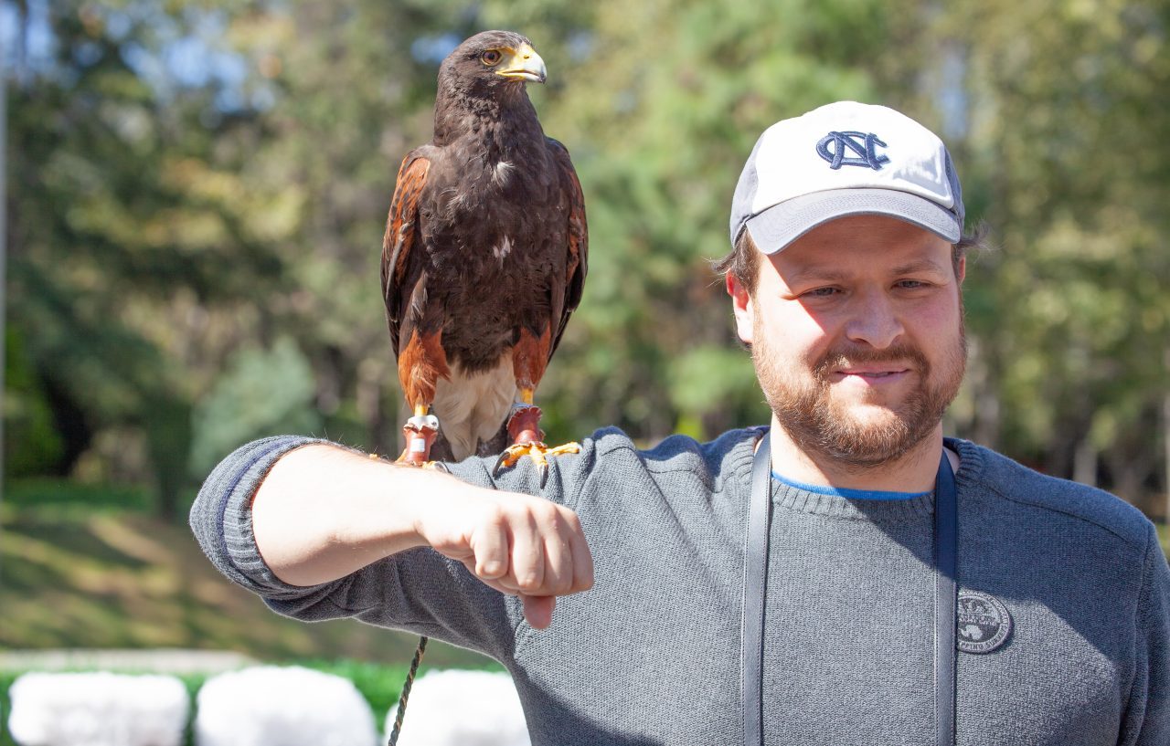 Mexico City, Mexico. Saturday, December 1, 2018. Man with a eagle at Los Pinos. The "Official Residence of Los Pinos" was the residence of the Mexican presidents. As of Saturday, December 1, 2018, it will be known as the "Los Pinos Cultural Complex." The official website says: "Los Pinos will be a completely open space for all Mexicans." Today was the inauguration of Mexican President Andrés Manuel López Obrador. People came to Los Pinos to celebrate this historic day. Credit: Photo by LoveIsAmor.com
