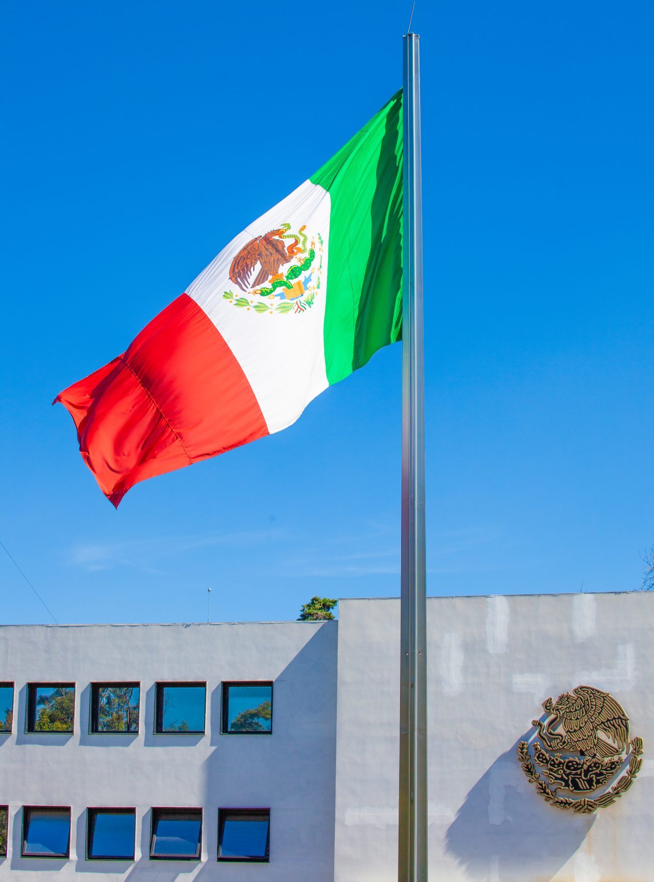 Mexico City, Mexico. Saturday, December 1, 2018. Mexican flag at Los Pinos. The "Official Residence of Los Pinos" was the residence of the Mexican presidents. As of Saturday, December 1, 2018, it will be known as the "Los Pinos Cultural Complex." The official website says: "Los Pinos will be a completely open space for all Mexicans." Today was the inauguration of Mexican President Andrés Manuel López Obrador. People came to Los Pinos to celebrate this historic day. Credit: Photo by LoveIsAmor.com