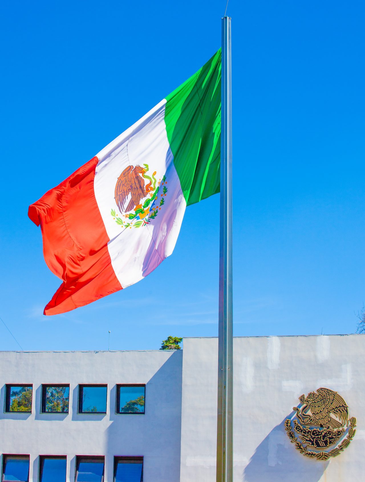 Mexico City, Mexico. Saturday, December 1, 2018. Mexican flag at Los Pinos. The "Official Residence of Los Pinos" was the residence of the Mexican presidents. As of Saturday, December 1, 2018, it will be known as the "Los Pinos Cultural Complex." The official website says: "Los Pinos will be a completely open space for all Mexicans." Today was the inauguration of Mexican President Andrés Manuel López Obrador. People came to Los Pinos to celebrate this historic day. Credit: Photo by LoveIsAmor.com