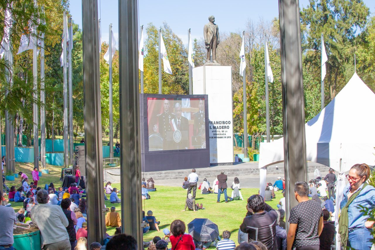 Mexico City, Mexico. Saturday, December 1, 2018. The first visitors to the new cultural facility listening to AMLO’s swearing in ceremony and his first address to the nation as president. The "Official Residence of Los Pinos" was the residence of the Mexican presidents. As of Saturday, December 1, 2018, it will be known as the "Los Pinos Cultural Complex." The official website says: "Los Pinos will be a completely open space for all Mexicans." Today was the inauguration of Mexican President Andrés Manuel López Obrador. People came to Los Pinos to celebrate this historic day. Credit: Photo by LoveIsAmor.com