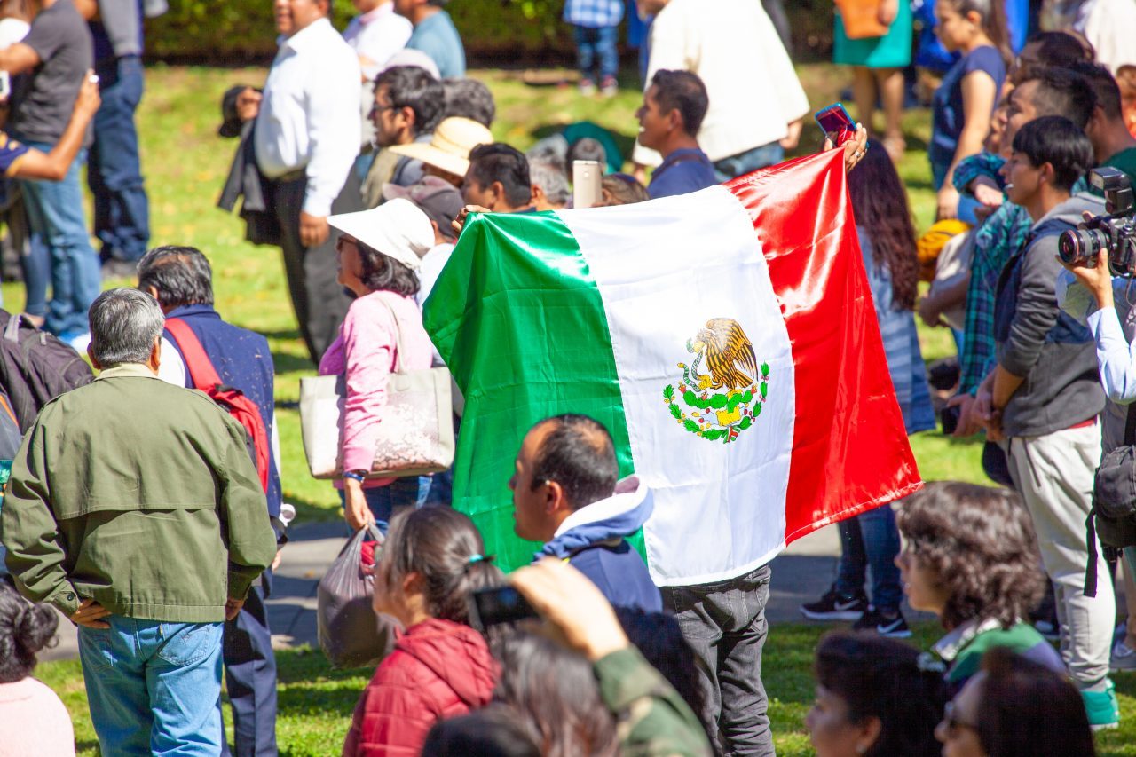 Mexico City, Mexico. Saturday, December 1, 2018. The first visitors to the new cultural facility listening to AMLO’s swearing in ceremony and his first address to the nation as president. The "Official Residence of Los Pinos" was the residence of the Mexican presidents. As of Saturday, December 1, 2018, it will be known as the "Los Pinos Cultural Complex." The official website says: "Los Pinos will be a completely open space for all Mexicans." Today was the inauguration of Mexican President Andrés Manuel López Obrador. People came to Los Pinos to celebrate this historic day. Credit: Photo by LoveIsAmor.com