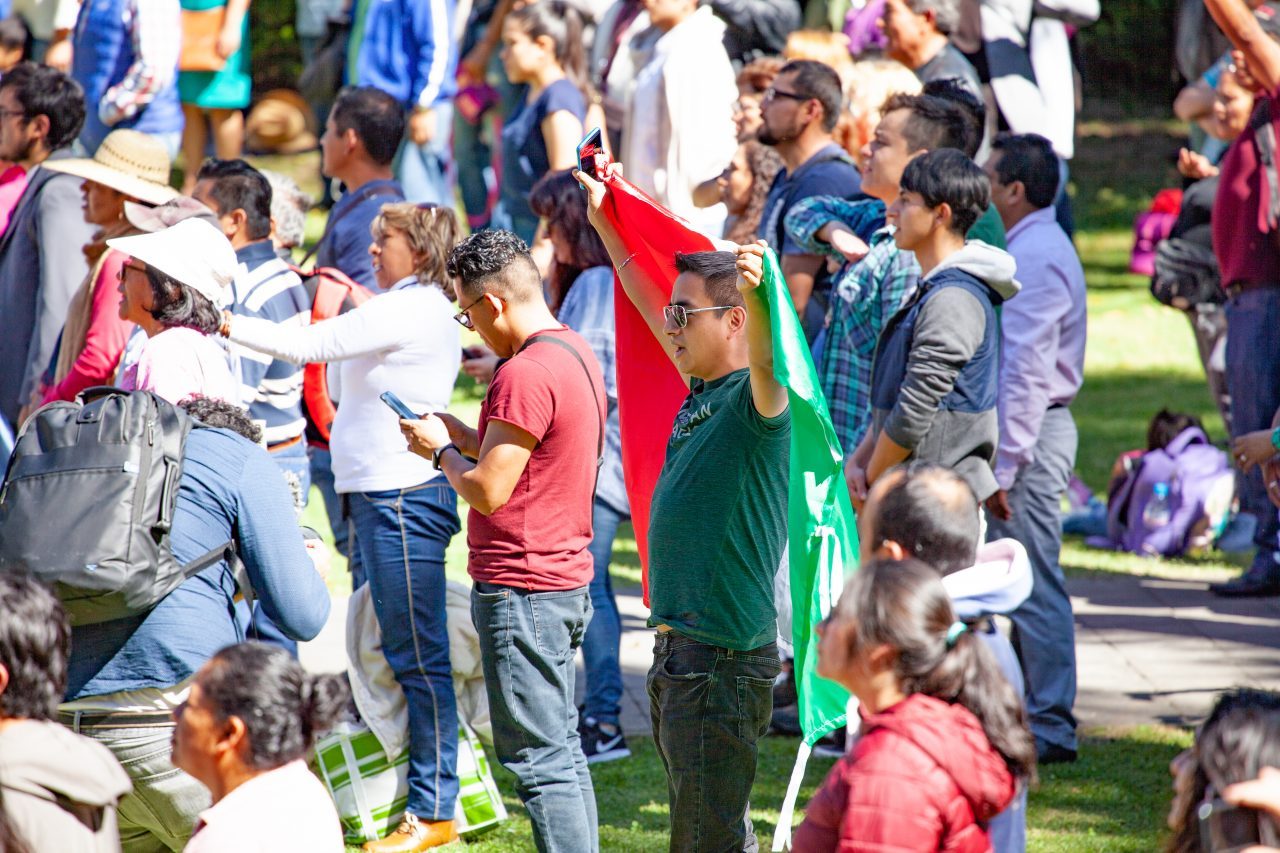 Mexico City, Mexico. Saturday, December 1, 2018. The first visitors to the new cultural facility listening to AMLO’s swearing in ceremony and his first address to the nation as president. The "Official Residence of Los Pinos" was the residence of the Mexican presidents. As of Saturday, December 1, 2018, it will be known as the "Los Pinos Cultural Complex." The official website says: "Los Pinos will be a completely open space for all Mexicans." Today was the inauguration of Mexican President Andrés Manuel López Obrador. People came to Los Pinos to celebrate this historic day. Credit: Photo by LoveIsAmor.com