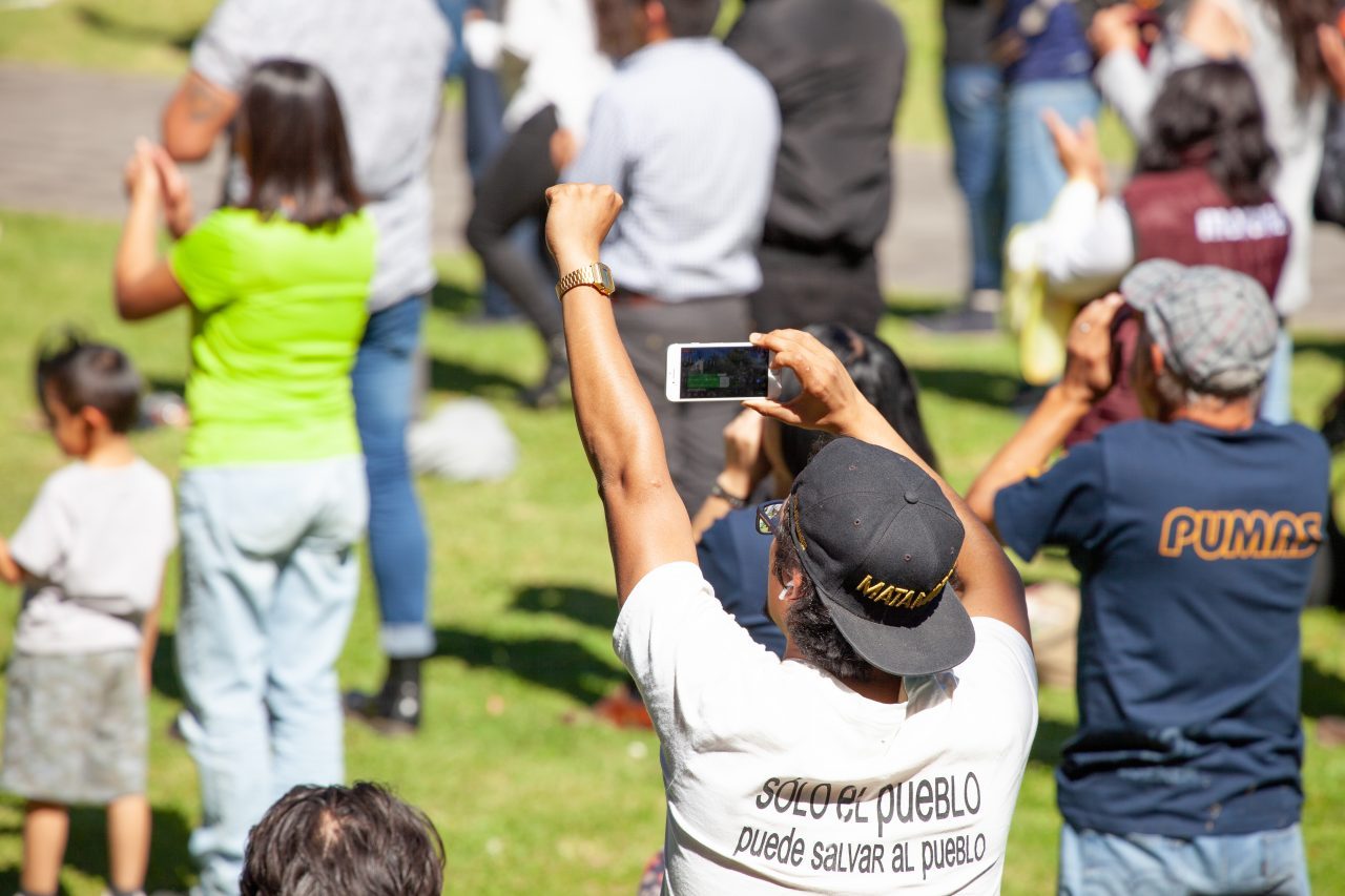 Mexico City, Mexico. Saturday, December 1, 2018. The first visitors to the new cultural facility listening to AMLO’s swearing in ceremony and his first address to the nation as president. The "Official Residence of Los Pinos" was the residence of the Mexican presidents. As of Saturday, December 1, 2018, it will be known as the "Los Pinos Cultural Complex." The official website says: "Los Pinos will be a completely open space for all Mexicans." Today was the inauguration of Mexican President Andrés Manuel López Obrador. People came to Los Pinos to celebrate this historic day. Credit: Photo by LoveIsAmor.com