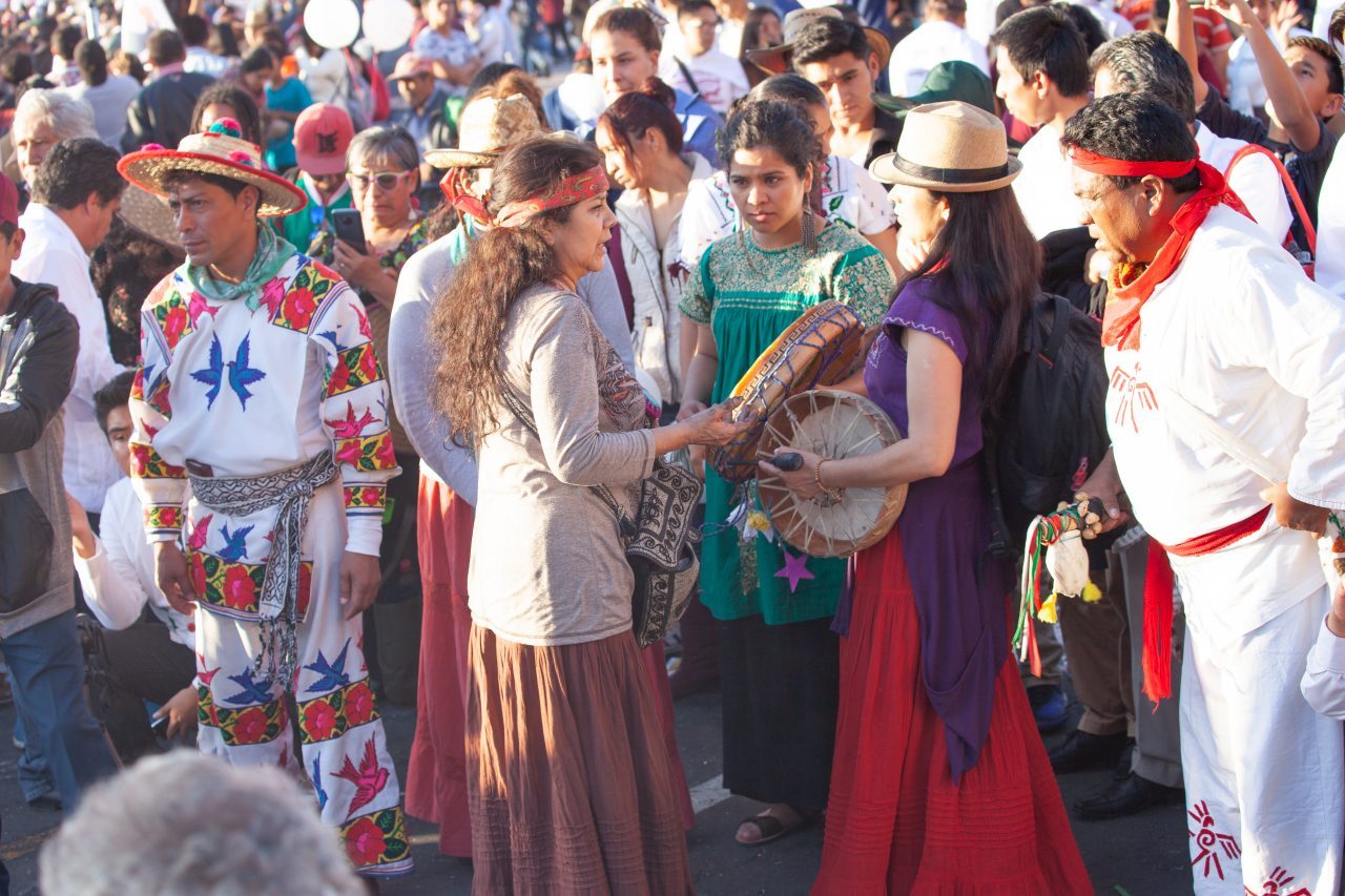 Mexico City, Mexico. Saturday, December 1, 2018. Mexicans celebrate on the Zocalo the inauguration of Mexican President Andrés Manuel López Obrador. People came to celebrate this historic day. López Obrador – known as AMLO - said, “We are going to govern for everyone, but we are going to give preference to the most impoverished and vulnerable. For the good of all, the poor come first.” Andrés Manuel received a spiritual cleansing by indigenous women and men as part of the celebrations. “What we want, what we desire is to purify public life in Mexico. I repeat my commitment: I will not lie, I will not steal or betray the people of Mexico,” the new President said during the religious ceremony. Credit: Photo by LoveIsAmor.com