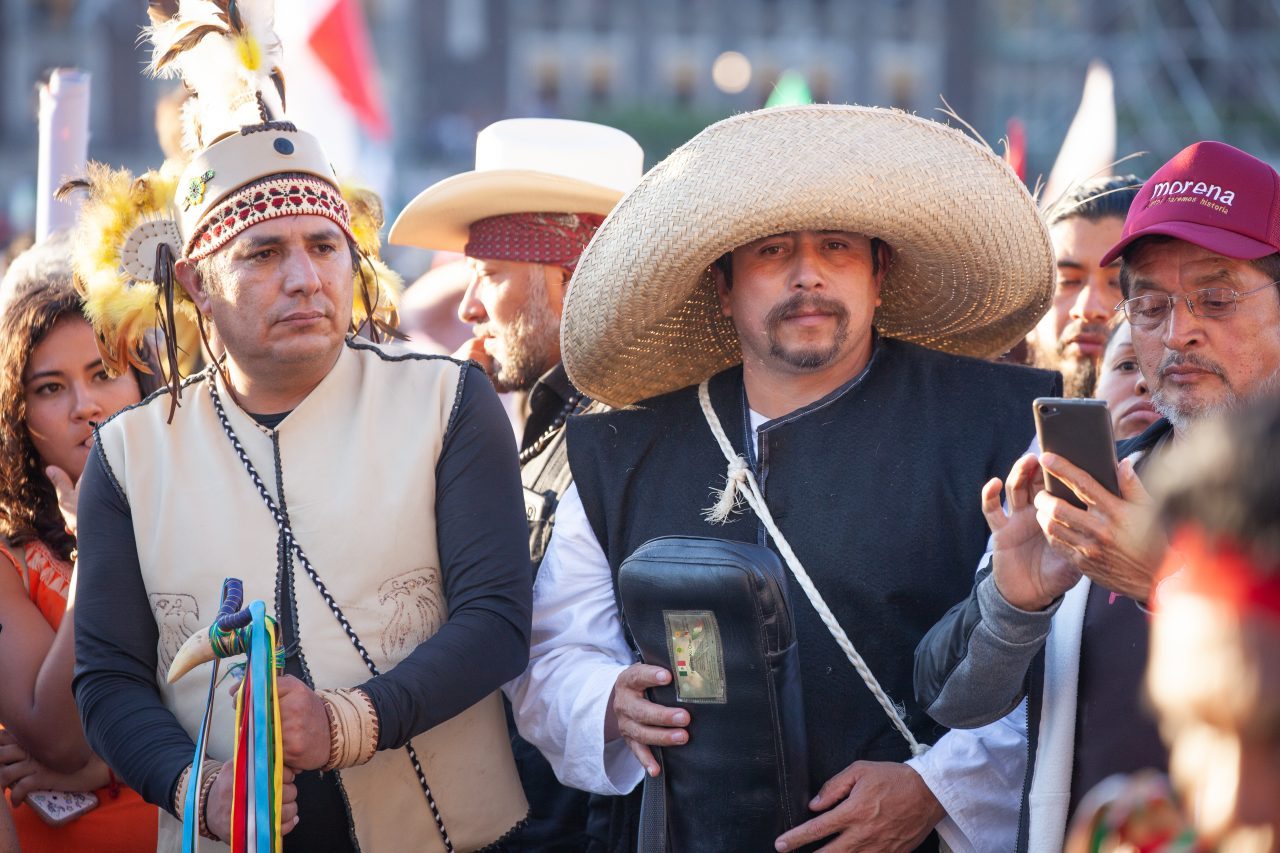 Mexico City, Mexico. Saturday, December 1, 2018. Mexicans celebrate on the Zocalo the inauguration of Mexican President Andrés Manuel López Obrador. People came to celebrate this historic day. López Obrador – known as AMLO - said, “We are going to govern for everyone, but we are going to give preference to the most impoverished and vulnerable. For the good of all, the poor come first.” Andrés Manuel received a spiritual cleansing by indigenous women and men as part of the celebrations. “What we want, what we desire is to purify public life in Mexico. I repeat my commitment: I will not lie, I will not steal or betray the people of Mexico,” the new President said during the religious ceremony. Credit: Photo by LoveIsAmor.com