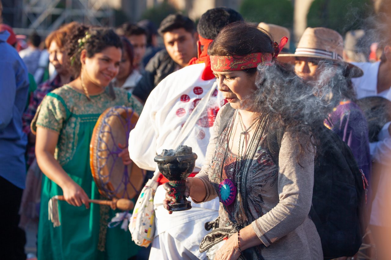 Mexico City, Mexico. Saturday, December 1, 2018. Mexicans celebrate on the Zocalo the inauguration of Mexican President Andrés Manuel López Obrador. People came to celebrate this historic day. López Obrador – known as AMLO - said, “We are going to govern for everyone, but we are going to give preference to the most impoverished and vulnerable. For the good of all, the poor come first.” Andrés Manuel received a spiritual cleansing by indigenous women and men as part of the celebrations. “What we want, what we desire is to purify public life in Mexico. I repeat my commitment: I will not lie, I will not steal or betray the people of Mexico,” the new President said during the religious ceremony. Credit: Photo by LoveIsAmor.com
