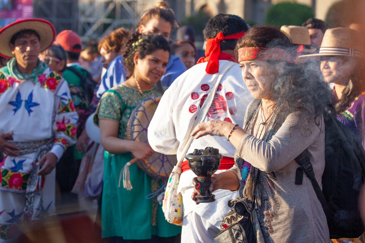 Mexico City, Mexico. Saturday, December 1, 2018. Mexicans celebrate on the Zocalo the inauguration of Mexican President Andrés Manuel López Obrador. People came to celebrate this historic day. López Obrador – known as AMLO - said, “We are going to govern for everyone, but we are going to give preference to the most impoverished and vulnerable. For the good of all, the poor come first.” Andrés Manuel received a spiritual cleansing by indigenous women and men as part of the celebrations. “What we want, what we desire is to purify public life in Mexico. I repeat my commitment: I will not lie, I will not steal or betray the people of Mexico,” the new President said during the religious ceremony. Credit: Photo by LoveIsAmor.com