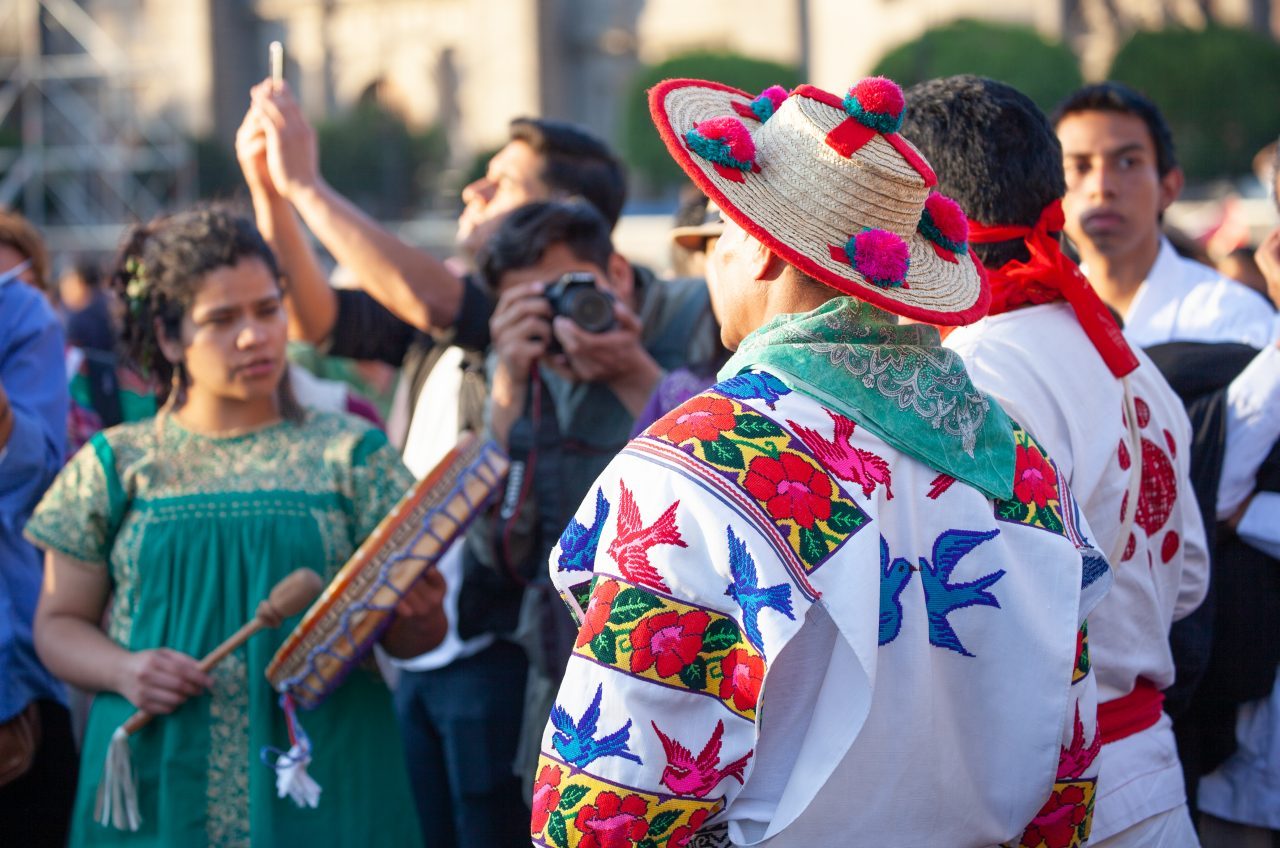 Mexico City, Mexico. Saturday, December 1, 2018. Mexicans celebrate on the Zocalo the inauguration of Mexican President Andrés Manuel López Obrador. People came to celebrate this historic day. López Obrador – known as AMLO - said, “We are going to govern for everyone, but we are going to give preference to the most impoverished and vulnerable. For the good of all, the poor come first.” Andrés Manuel received a spiritual cleansing by indigenous women and men as part of the celebrations. “What we want, what we desire is to purify public life in Mexico. I repeat my commitment: I will not lie, I will not steal or betray the people of Mexico,” the new President said during the religious ceremony. Credit: Photo by LoveIsAmor.com