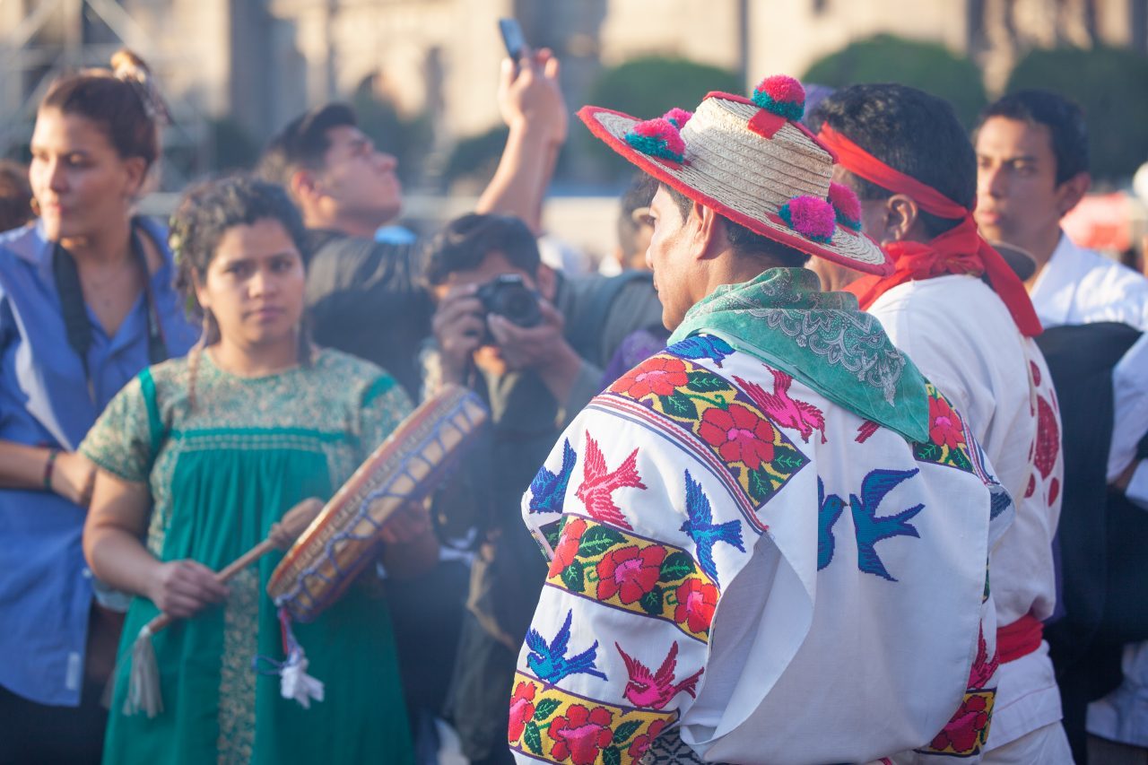 Mexico City, Mexico. Saturday, December 1, 2018. Mexicans celebrate on the Zocalo the inauguration of Mexican President Andrés Manuel López Obrador. People came to celebrate this historic day. López Obrador – known as AMLO - said, “We are going to govern for everyone, but we are going to give preference to the most impoverished and vulnerable. For the good of all, the poor come first.” Andrés Manuel received a spiritual cleansing by indigenous women and men as part of the celebrations. “What we want, what we desire is to purify public life in Mexico. I repeat my commitment: I will not lie, I will not steal or betray the people of Mexico,” the new President said during the religious ceremony. Credit: Photo by LoveIsAmor.com
