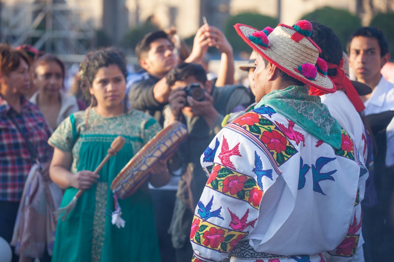 Mexico City, Mexico. Saturday, December 1, 2018. Mexicans celebrate on the Zocalo the inauguration of Mexican President Andrés Manuel López Obrador. People came to celebrate this historic day. López Obrador – known as AMLO - said, “We are going to govern for everyone, but we are going to give preference to the most impoverished and vulnerable. For the good of all, the poor come first.” Andrés Manuel received a spiritual cleansing by indigenous women and men as part of the celebrations. “What we want, what we desire is to purify public life in Mexico. I repeat my commitment: I will not lie, I will not steal or betray the people of Mexico,” the new President said during the religious ceremony. Credit: Photo by LoveIsAmor.com