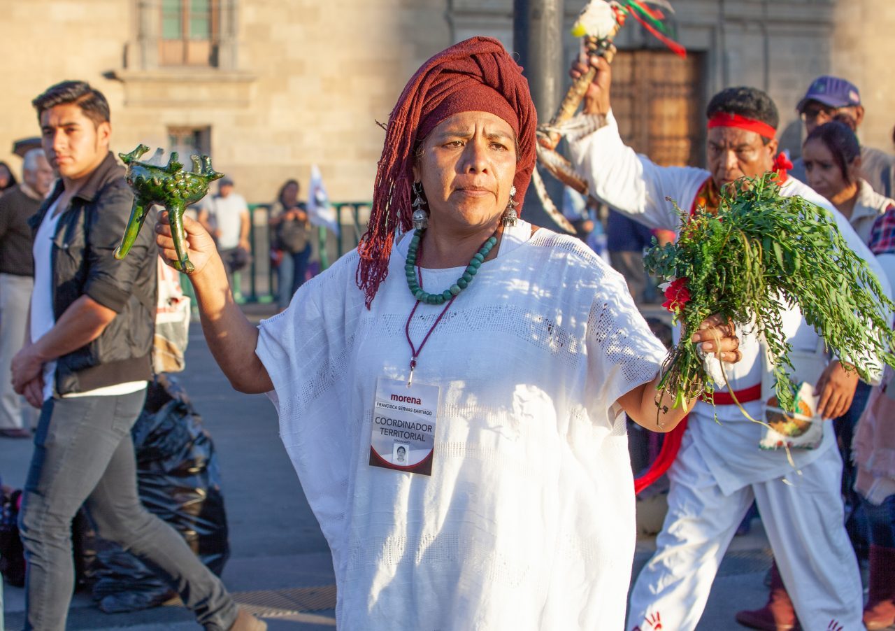 Mexico City, Mexico. Saturday, December 1, 2018. Mexicans celebrate on the Zocalo the inauguration of Mexican President Andrés Manuel López Obrador. People came to celebrate this historic day. López Obrador – known as AMLO - said, “We are going to govern for everyone, but we are going to give preference to the most impoverished and vulnerable. For the good of all, the poor come first.” Andrés Manuel received a spiritual cleansing by indigenous women and men as part of the celebrations. “What we want, what we desire is to purify public life in Mexico. I repeat my commitment: I will not lie, I will not steal or betray the people of Mexico,” the new President said during the religious ceremony. Credit: Photo by LoveIsAmor.com