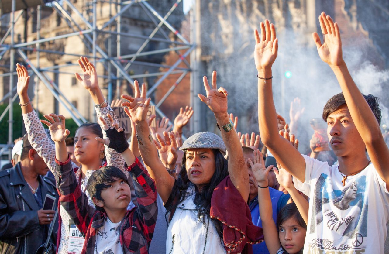 Mexico City, Mexico. Saturday, December 1, 2018. Mexicans celebrate on the Zocalo the inauguration of Mexican President Andrés Manuel López Obrador. People came to celebrate this historic day. López Obrador – known as AMLO - said, “We are going to govern for everyone, but we are going to give preference to the most impoverished and vulnerable. For the good of all, the poor come first.” Andrés Manuel received a spiritual cleansing by indigenous women and men as part of the celebrations. “What we want, what we desire is to purify public life in Mexico. I repeat my commitment: I will not lie, I will not steal or betray the people of Mexico,” the new President said during the religious ceremony. Credit: Photo by LoveIsAmor.com