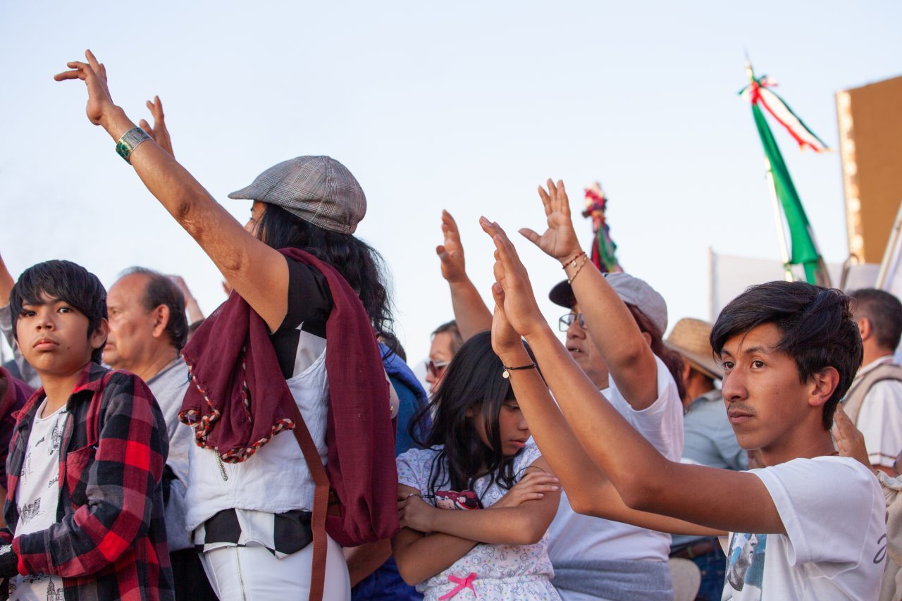 Mexico City, Mexico. Saturday, December 1, 2018. Mexicans celebrate on the Zocalo the inauguration of Mexican President Andrés Manuel López Obrador. People came to celebrate this historic day. López Obrador – known as AMLO - said, “We are going to govern for everyone, but we are going to give preference to the most impoverished and vulnerable. For the good of all, the poor come first.” Andrés Manuel received a spiritual cleansing by indigenous women and men as part of the celebrations. “What we want, what we desire is to purify public life in Mexico. I repeat my commitment: I will not lie, I will not steal or betray the people of Mexico,” the new President said during the religious ceremony. Credit: Photo by LoveIsAmor.com