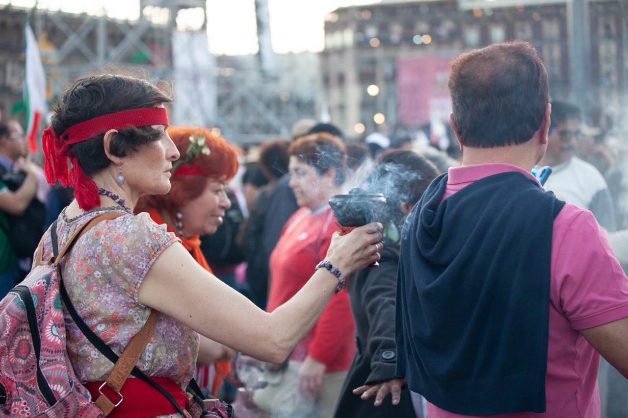 Mexico City, Mexico. Saturday, December 1, 2018. Mexicans celebrate on the Zocalo the inauguration of Mexican President Andrés Manuel López Obrador. People came to celebrate this historic day. López Obrador – known as AMLO - said, “We are going to govern for everyone, but we are going to give preference to the most impoverished and vulnerable. For the good of all, the poor come first.” Andrés Manuel received a spiritual cleansing by indigenous women and men as part of the celebrations. “What we want, what we desire is to purify public life in Mexico. I repeat my commitment: I will not lie, I will not steal or betray the people of Mexico,” the new President said during the religious ceremony. Credit: Photo by LoveIsAmor.com