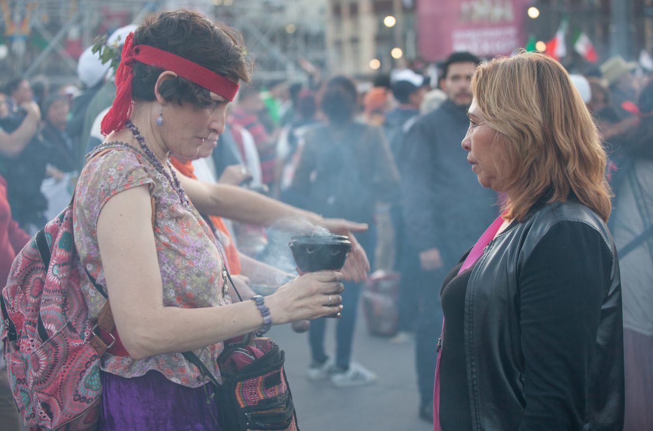 Mexico City, Mexico. Saturday, December 1, 2018. Mexicans celebrate on the Zocalo the inauguration of Mexican President Andrés Manuel López Obrador. People came to celebrate this historic day. López Obrador – known as AMLO - said, “We are going to govern for everyone, but we are going to give preference to the most impoverished and vulnerable. For the good of all, the poor come first.” Andrés Manuel received a spiritual cleansing by indigenous women and men as part of the celebrations. “What we want, what we desire is to purify public life in Mexico. I repeat my commitment: I will not lie, I will not steal or betray the people of Mexico,” the new President said during the religious ceremony. Credit: Photo by LoveIsAmor.com