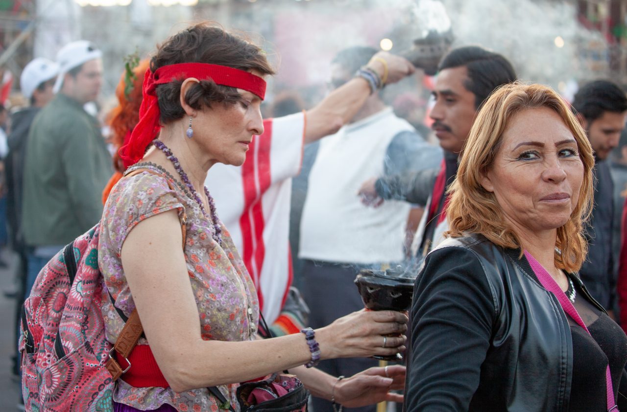 Mexico City, Mexico. Saturday, December 1, 2018. Mexicans celebrate on the Zocalo the inauguration of Mexican President Andrés Manuel López Obrador. People came to celebrate this historic day. López Obrador – known as AMLO - said, “We are going to govern for everyone, but we are going to give preference to the most impoverished and vulnerable. For the good of all, the poor come first.” Andrés Manuel received a spiritual cleansing by indigenous women and men as part of the celebrations. “What we want, what we desire is to purify public life in Mexico. I repeat my commitment: I will not lie, I will not steal or betray the people of Mexico,” the new President said during the religious ceremony. Credit: Photo by LoveIsAmor.com