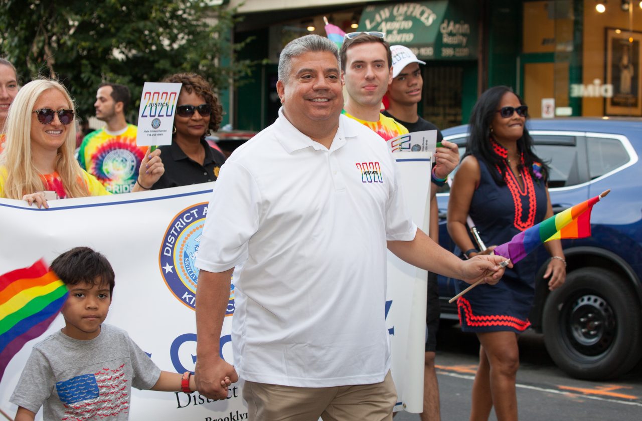 Saturday, June 8th, 2019. Brooklyn, New York City - Brooklyn District Attorney Eric Gonzalez, his son and other people at the Brooklyn Pride Parade/March. This year, Brooklyn celebrated the 23rd Annual Brooklyn Pride Parade/March. Brooklyn Pride was ranked within the top 10 of the 20 best places in the US to celebrate pride by matadornetwork.com. This year is the 50th anniversary of the Stonewall revolution. Credit: Photo by LoveIsAmor.com