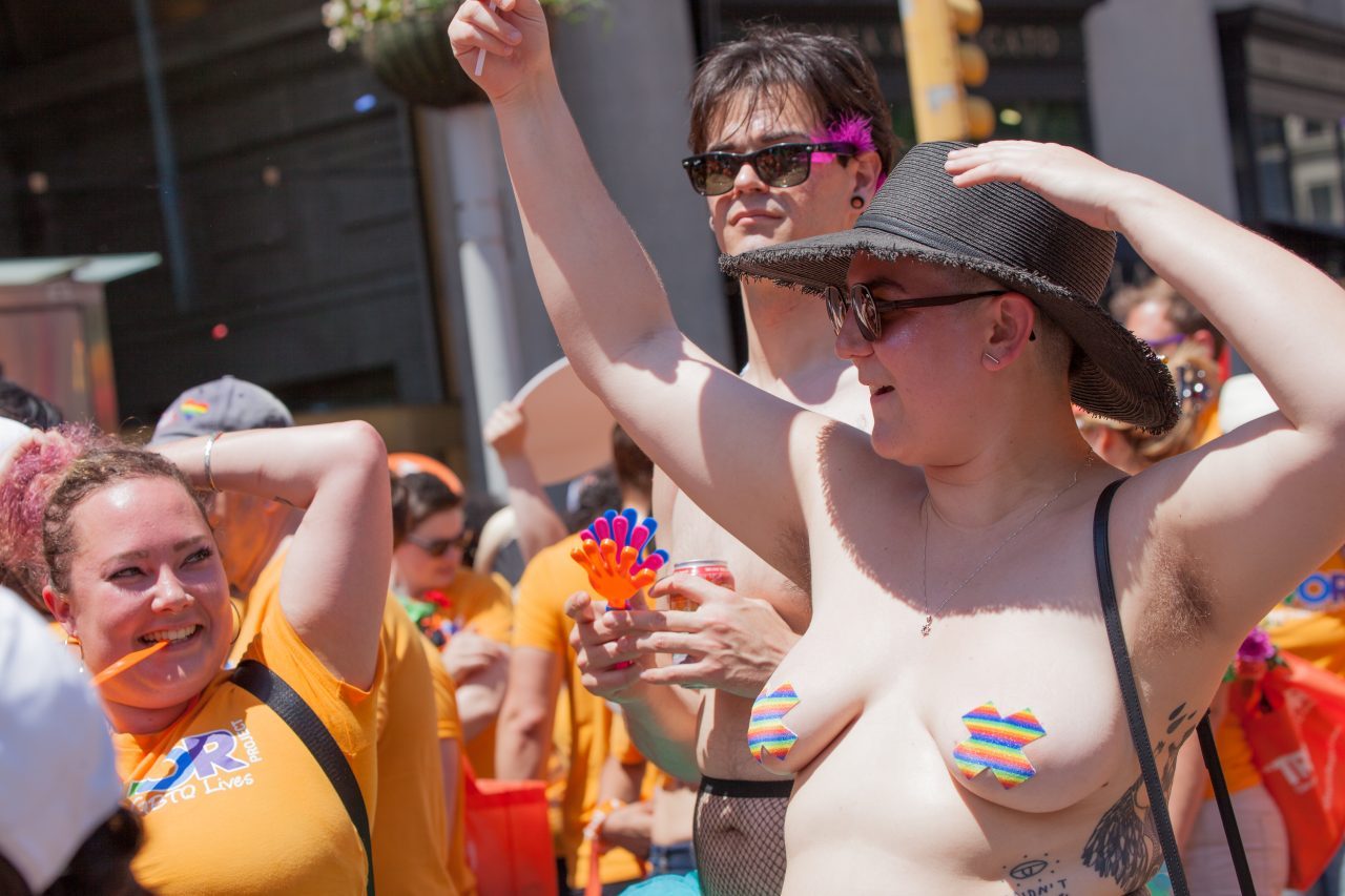 Sunday, June 30th, 2019. New York City - Topless woman at the NYC Pride March. The 50th anniversary of the Stonewall Rebellion was on Friday, June 28th, 2019. People from around the world came to New York City to celebrate. Credit: Photo by LoveIsAmor.com