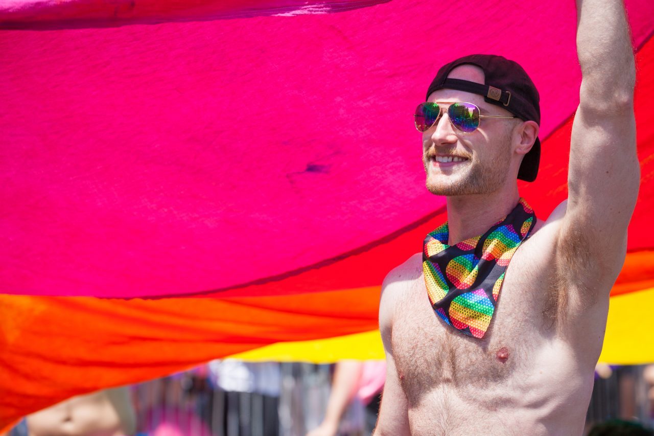 Sunday, June 30th, 2019. New York City - Shirtless man at the NYC Pride March. The 50th anniversary of the Stonewall Rebellion was on Friday, June 28th, 2019. People from around the world came to New York City to celebrate. Credit: Photo by LoveIsAmor.com